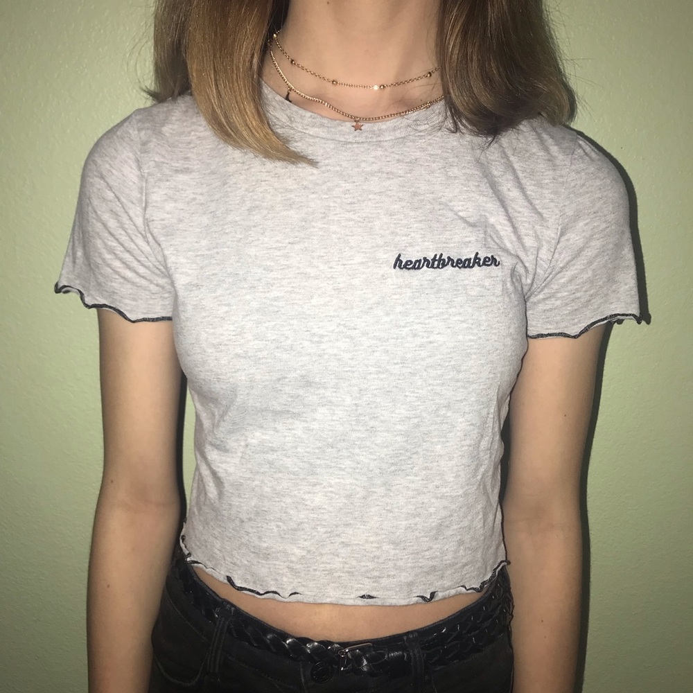 Cute Short sleeve shirt with fringe.